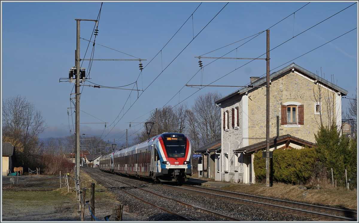 Die beiden SBB LEX RABe 522 229 und 226 sind als Léman Express SL2 23416 von Annemasse nach Annecy unterwegs und fahren durch die (Dienst)-Station St-Laurent. 

12. Februar 2022