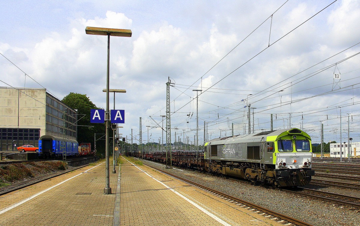 Die Class 66 6603 von Captrain fährt mit einem Aluminiumleerzug aus Nievenheim bei Dormagen nach Kinkempois(B)Dunkerque(F) bei Ausfahrt aus Aachen-West und fährt in Richtung Montzen/Belgien.
Aufgenommen vom Bahnsteig in Aachen-West bei Sonne und Wolken Mix am 16.8.2014.