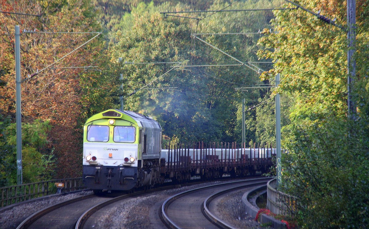 Die Class 66 6603 von Captrain kommt als Umleiter durch Aachen-Schanz aus Richtung Aachen-West mit einem Aluminiumzug aus Dunkerque(F)Kinkempois(B) nach Nievenheim bei Dormagen und fährt in Richtung Aachen-Hbf,Köln. 
Bei schönem Sonnenschein am Abend vom 19.9.2014.