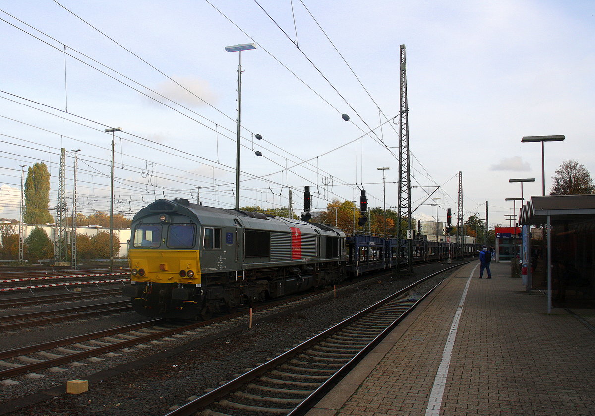 Die Class 66 DE6309 von DLC Railways kommt aus Richtung Montzen/Belgien mit einem Autoleerzug aus Zeebrugge(B) nach Tychy(PL) und fährt in Aachen-West ein. Aufgenommen vom Bahnsteig in Aachen-West.
Bei Sonnenschein und Wolken am Kalten Nachmittag vom 3.11.2016. 