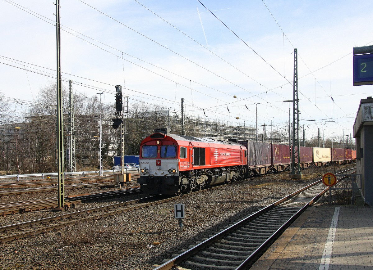 Die Class 66 DE6310  Griet  von Crossrail kommt aus Richtung Montzen/Belgien mit einem langen Containerzug aus Zeebrugge-Ramskapelle(B) nach Milano(I)  und fährt in Aachen-West ein.
Aufgenommen vom Bahnsteig in Aachen-West.
Bei schönem Frühlingswetter am 7.3.2015.