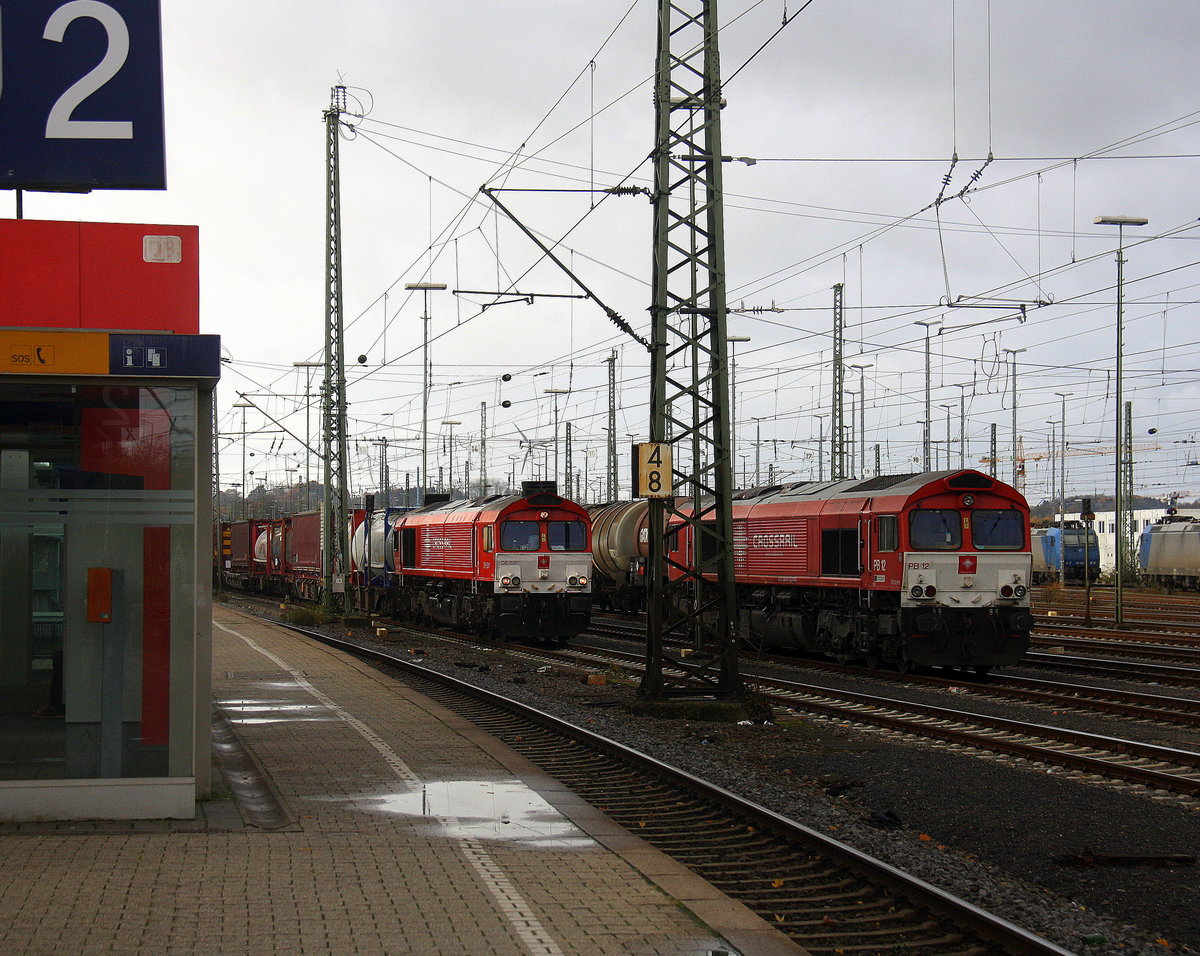 Die Class 66 DE6311  Hanna  von Crossrail fährt mit viel Dieselpower mit einem  Containerzug aus Ludwigshafen(D) nach Zeebrugge-Ramskapelle(B)  bei der Ausfahrt aus Aachen-West und fährt in Richtung Montzen/Belgien.
Aufgenommen vom Bahnsteig in Aachen-West.
Bei Sonnenschein am Kalten Mittag vom 19.11.2017.