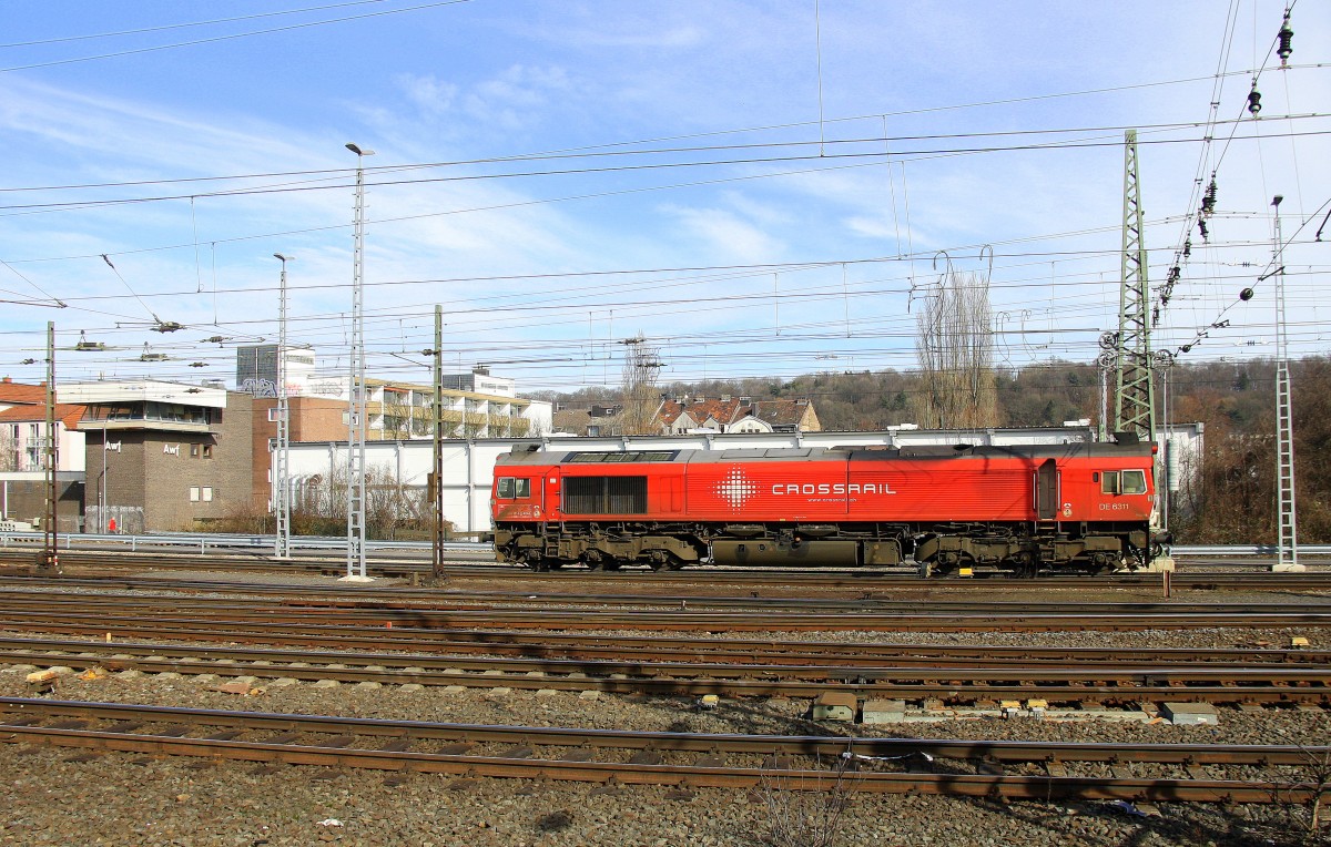 Die Class 66 DE6311  Hanna  von Crossrail rangiert in Aachen-West. Aufgenommen vom Bahnsteig in Aachen-West bei schönem Frühlingswetter am 7.3.2015.