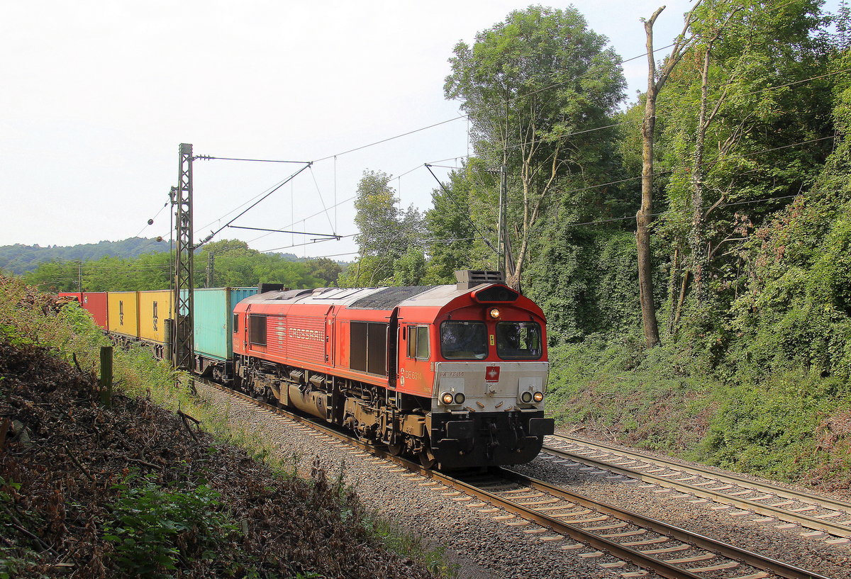 Die Class 66 DE6314  Hanna  von Crossrail kommt die Gemmenicher-Rampe herunter nach Aachen-West mit einem MSC-Containerzug aus Antwerpen-Krommenhoek(B) nach Germersheim(D). Aufgenommen an der Montzenroute am Gemmenicher-Weg. 
Bei Sommerwetter am Mittag vom 25.7.2018.