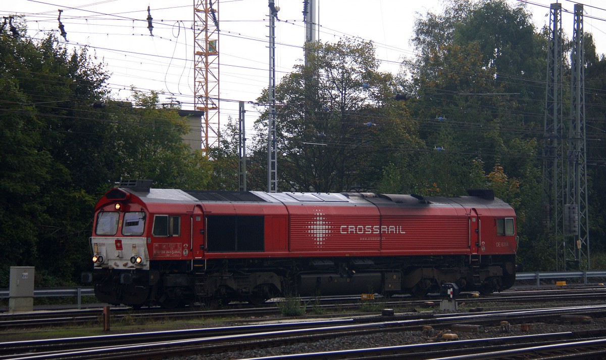 Die Class 66 DE6314  Hanna  von Crossrail rangiert in Aachen-West. 
Aufgenommen vom Bahnsteig in Aachen-West bei Regenwolken am Nachmittag vom 7.10.2014.