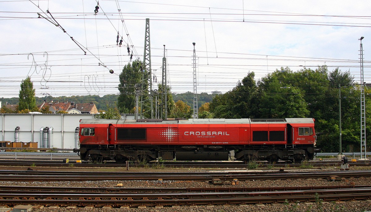 Die Class 66 PB03  Mireille  von Crossrail rangiert in Aachen-West. Aufgenommen vom Bahnsteig in Aachen-West bei Sonne und Wolken am Mittag vom 20.9.2014. 