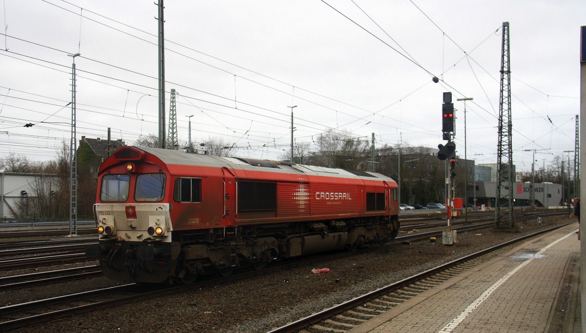 Die Class 66 PB03  Mireille  von Crossrail rangiert in Aachen-West. 
Aufgenommen vom Bahnsteig in Aachen-West.
Bei Nieselregen am Morgen vom 22.2.2016.