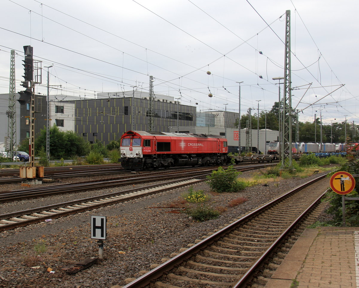 Die Class 66 PB12  Marleen  von Crossrail  kommt aus Richtung Montzen/Belgien mit einem  Güterzug aus Zeebrugge(B) nach Novara(I) und fährt in Aachen-West ein.
Aufgenommen vom Bahnsteig in Aachen-West.
 Bei Sonne und Wolken am Mittag vom 11.8.2019.