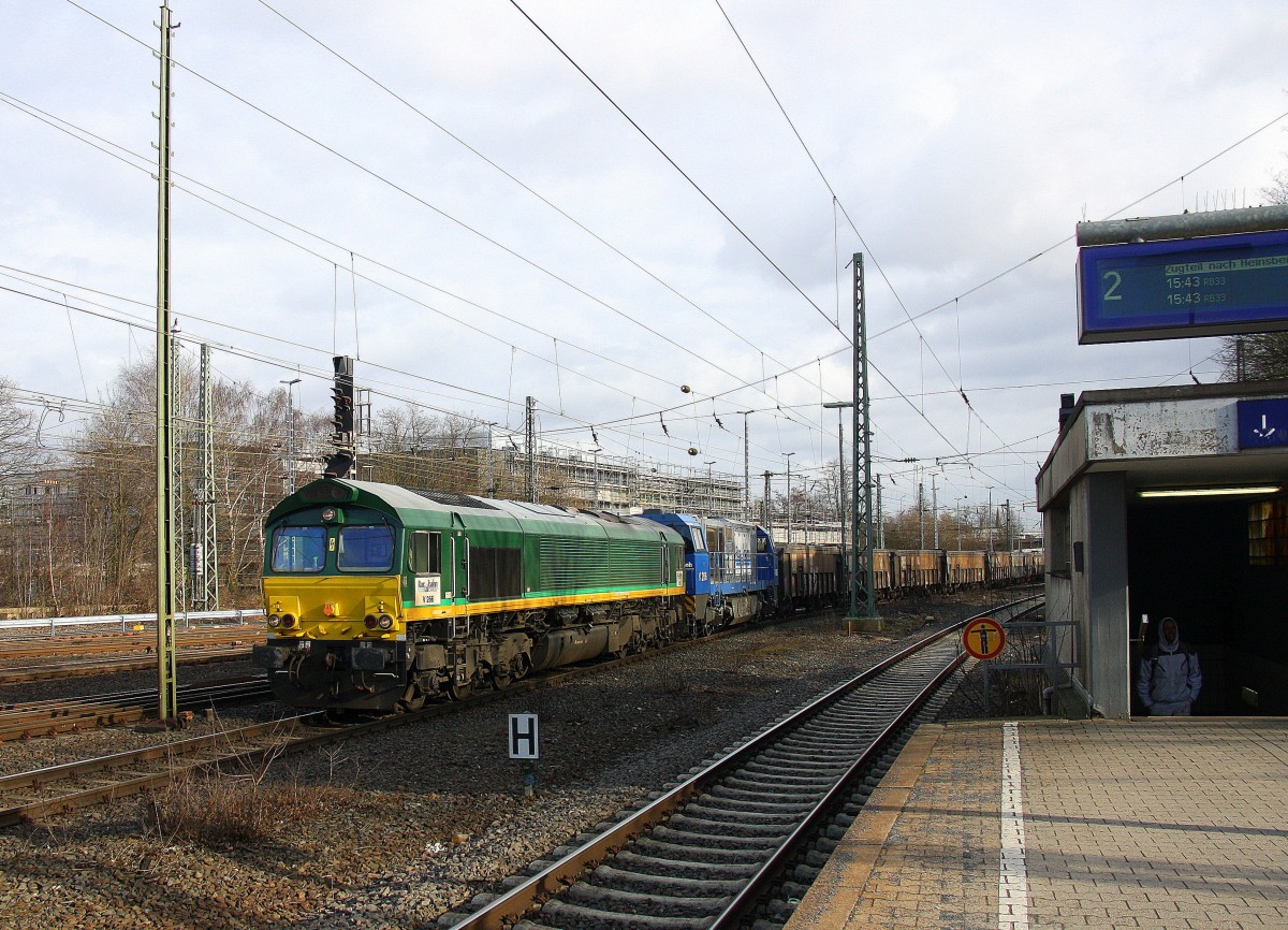 Die Class 66 V266/PB10 und die V206 beide von der Rurtalbahn und kommen mit einem Kurzen Bleizug aus Antwerpen-Lillo(B) nach Stolberg-Hammer und fahren in Aachen-West ein.
Aufgenommen vom Bahnsteig in Aachen-West bei schönem Sonnenschein am Kalten Nachmittag vom 27.2.2015.