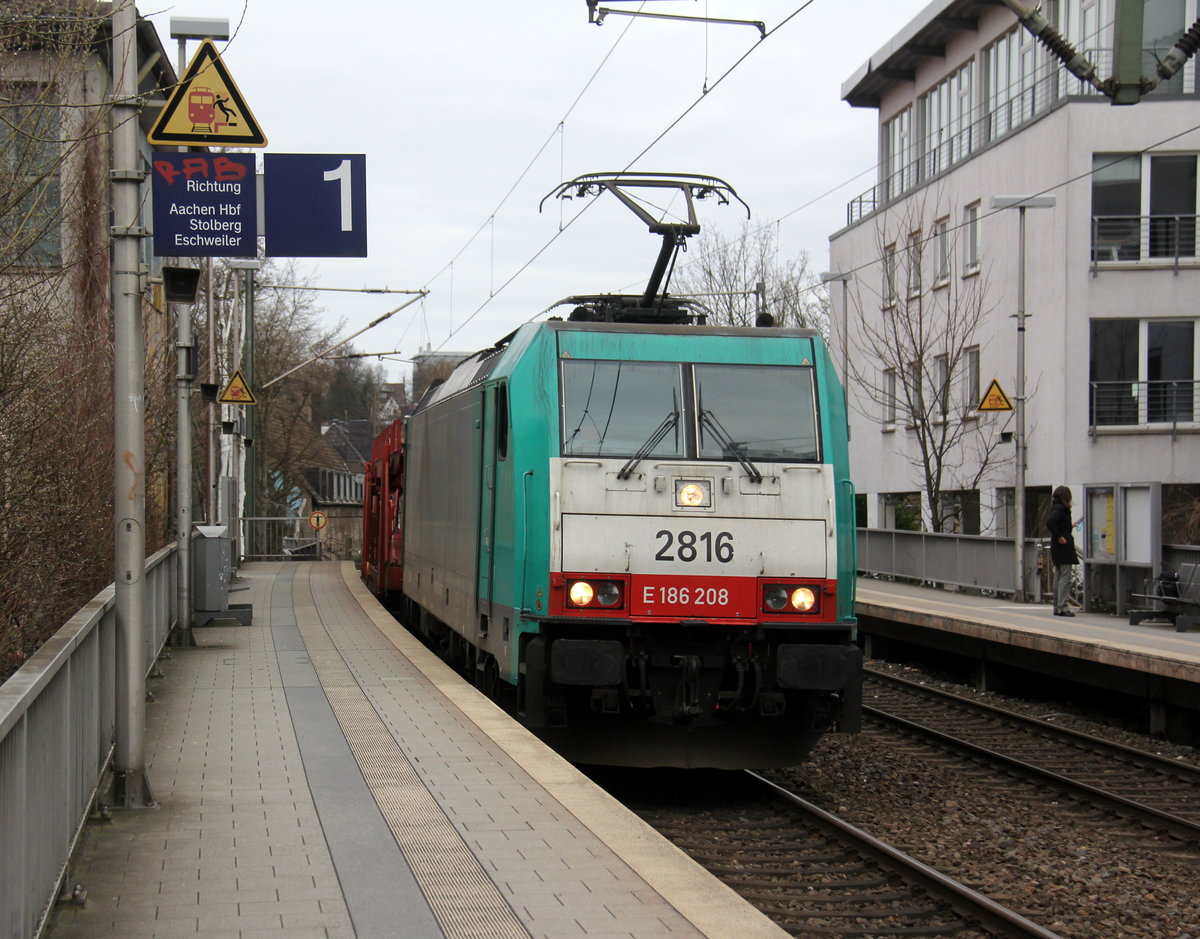Die Cobra 2816 kommt aus Richtung Aachen-West mit einem Autoleerzug aus Muizen(B) nach Köln-Gremerg(D) und fährt durch Aachen-Schanz in Richtung Aachen-Hbf,Aachen-Rothe-Erde,Stolberg-Hbf(Rheinland)Eschweiler-Hbf,Langerwehe,Düren,Merzenich,Buir,Horrem,Kerpen-Köln-Ehrenfeld,Köln-West,Köln-Süd. 
Aufgenommen vom Bahnsteig von Aachen-Schanz. 
Am Morgen vom 20.3.2019.