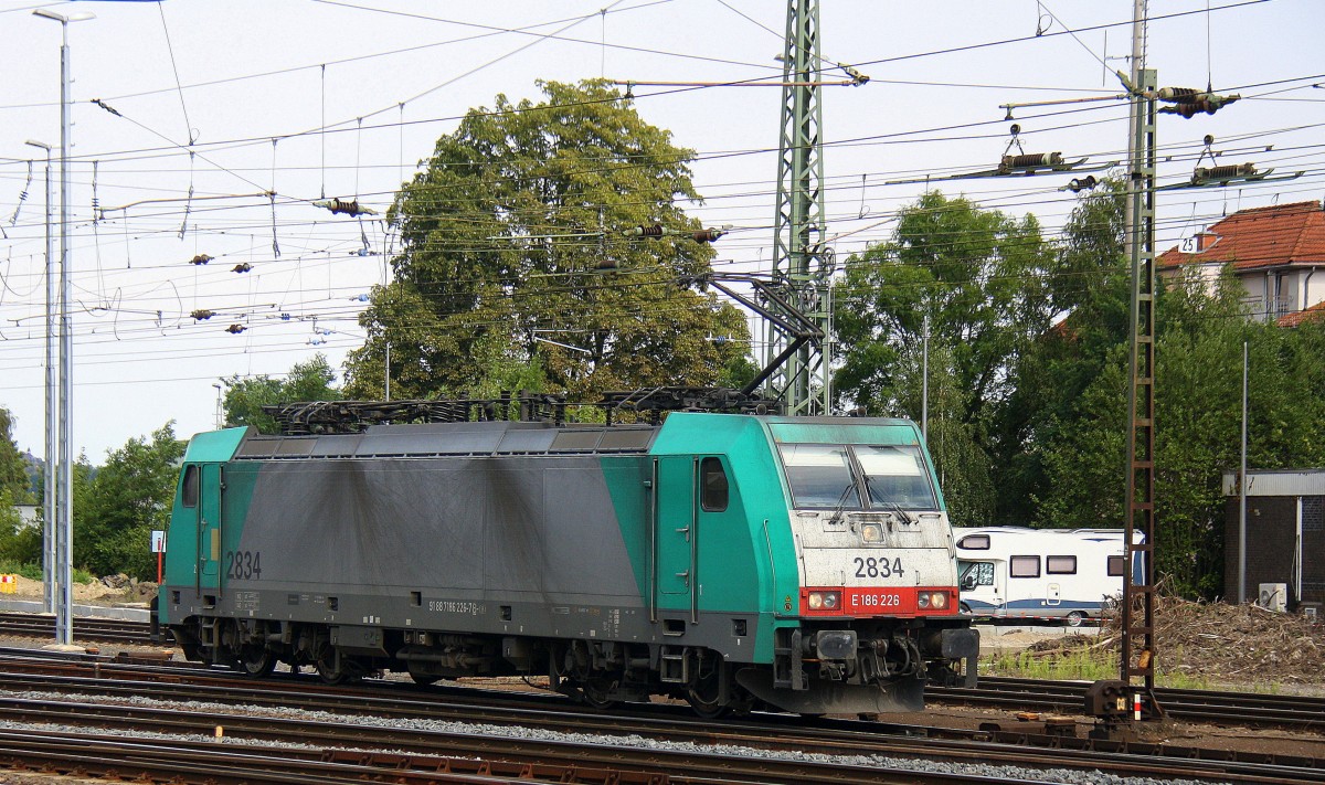 Die Cobra 2834 fährt als Lokzug von Aachen-West nach Montzen/Belgien. 
Aufgenommen vom Bahnsteig in Aachen-West bei schönem Sonnenschein am 6.8.2014. 