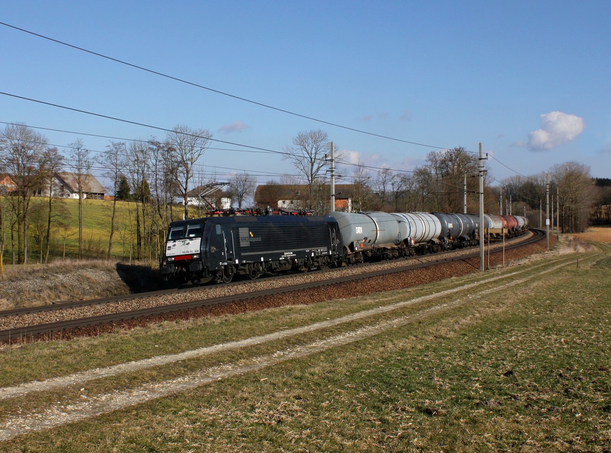 Die ES 64 F4-458 mit einem Kesselzug am 23.02.2014 unterwegs bei Kimpling.