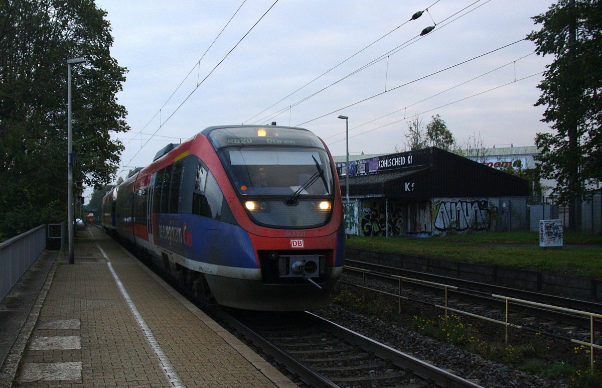 Die Euregiobahn (RB20) kommt aus Heerlen(NL)-Stolberg-Altstadt-Düren und kommt die Kohlscheider-Rampe hoch aus Richtung Herzogenrath und hält in Kohlscheid und fährt in Richtung Richterich,Laurensberg,Aachen-West.
Bei Sonne und Wolken am Morgen vom 23.10.2014.