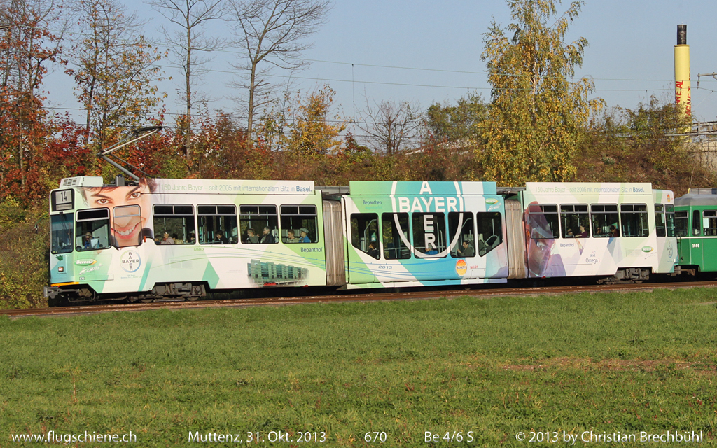 Die Firma Bayer feiert Ihr 150 Jahre Jubilum, mit Sitz in Basel seit 2005. Weshalb die Snfte Be 4/6S 670 der BVB mit dieser speziellen Bemalung versehen wurde. Hier am 31. Oktober 2013 kurz nach der Tramstation Lachmatt hier aber schon auf Muttenzer Boden.  