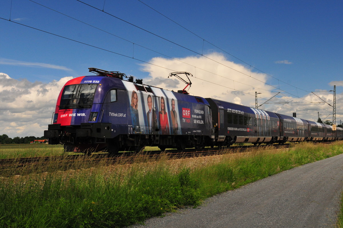 Die ÖBB 1116 232 mit dem  ORF TVthek railjet  am 12.06.2016 bei Übersee am Chiemsee in Richtung Kufstein.