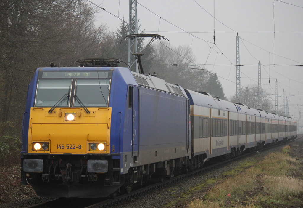 Die OLA-Lok 146 522-8 mit InterConnex 68904 von Warnemnde nach Leipzig Hbf bei der Durchfahrt im Bahnhof Rostock-Bramow.05.12.2014 