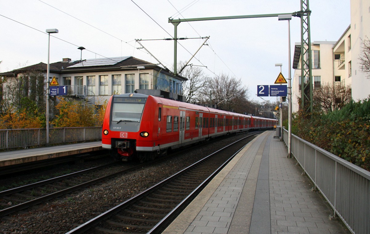 Die Rhein Niers Bahn (RB33) aus Duisburg-Hbf nach Aachen-Hbf und kommt aus Richtung Aachen-West und hält in Aachen-Schanz und fährt in Richtung Aachen-Hbf. 
Bei Sonne und Wolken am Nachmittag vom 8.12.2015.