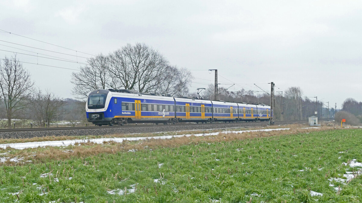 Die RS2 (Regio-S-Bahn Bremen/Niedersachsen) Twistringen - Bremen Hbf - Bremerhaven-Lehe zwischen Lunestedt und Loxstedt. Zum Einsatz kommen Fahrzeuge vom Typ Alstom Coradia Continental der NordWestBahn.
Aufgenommen im Januar 2019.