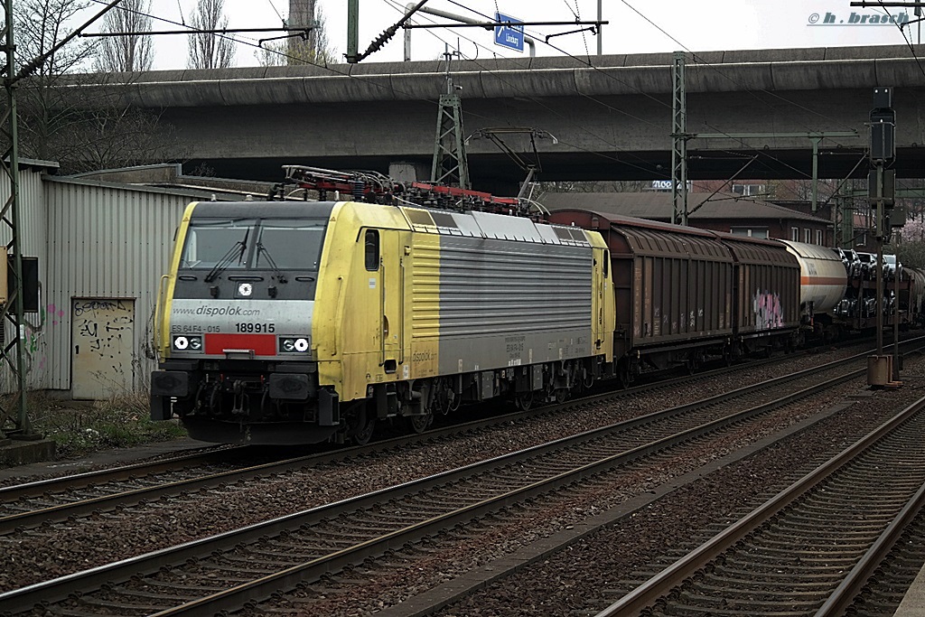 dispolok 189 975 ist mit einen gemischten güterzug am 25.03.14 durch hh-harburg gefahren