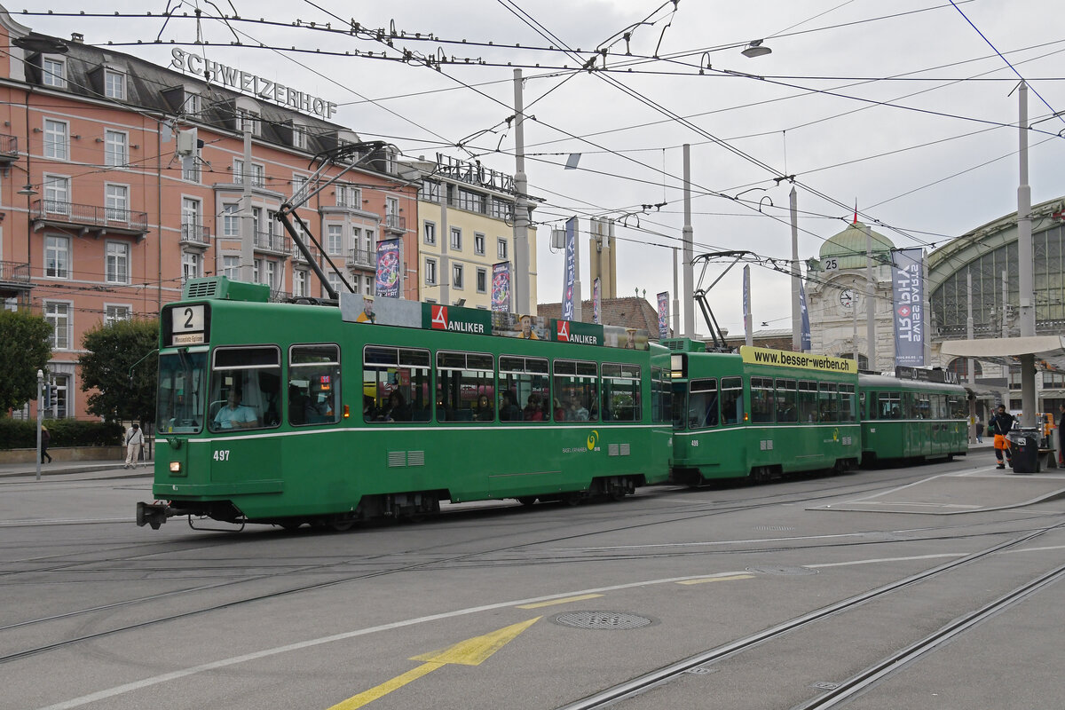 Doppeltraktion, mit den Be 4/4 497 und 499 zusammen mit dem B4S 1491, auf der Linie 2, verlässt am 16.09.2024 die Haltestelle beim Bahnhof SBB. Aufnahme Basel.