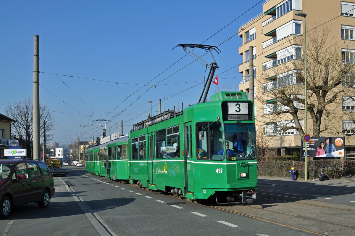 Dreiwagenzug mit dem Be 4/4 497 an der Spitze auf der Linie 3 kurz vor der Haltestelle Salinenstrasse. Die Aufnahme stammt vom 10.02.2015.