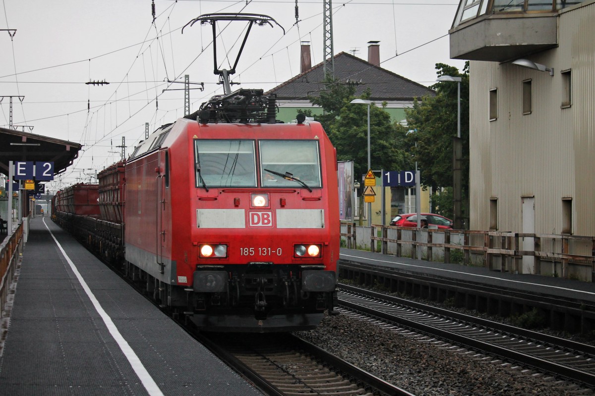 Durchfahrt von 185 131-0 am 30.07.2014 mit einem gemischten Güterzug in Müllheim (Baden) gen Süden.