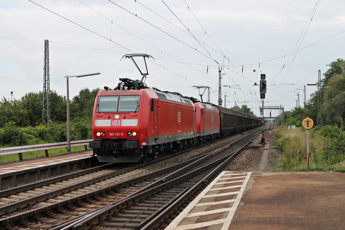 Durchfahrt am 02.09.2014 von 185 131-0 zusammen mit der 185 097-3 und einem H-Wagenzug in Orschweier gen Süden.