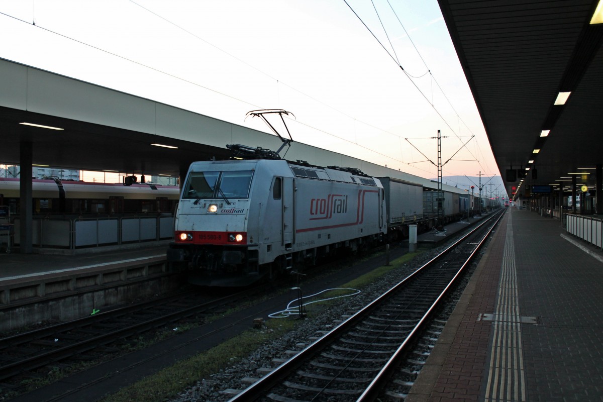 Durchfahrt am 21.03.2014 von Crossrail 185 580-8  Jana  mit einem Containerzug aus Italien in Basel Bad Bf.
