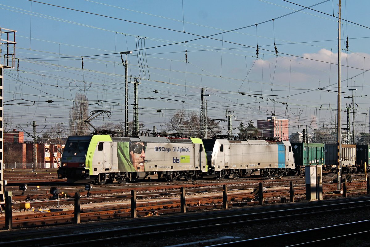 Durchfahrt am Nachmittag des 14.02.2018 von Re 486 505 zusammen mit Rpool/BLSC 186 106 und einem Containerzug durch den Badischen Bahnhof von Basel in Richtung Deutschland.