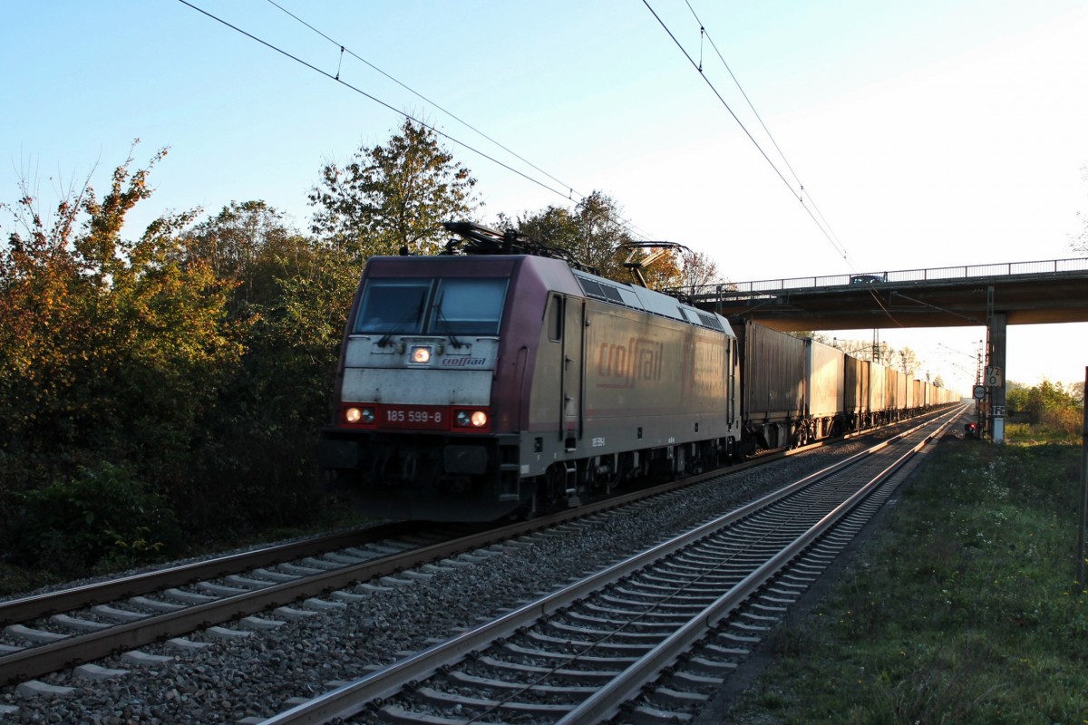 Durchfahrt von Crossrail 185 599-8 am 31.10.2013  Halloween  mit einem langen KLV von den Bahnhof von Orschweier (KBS 703) gen Offenburg.