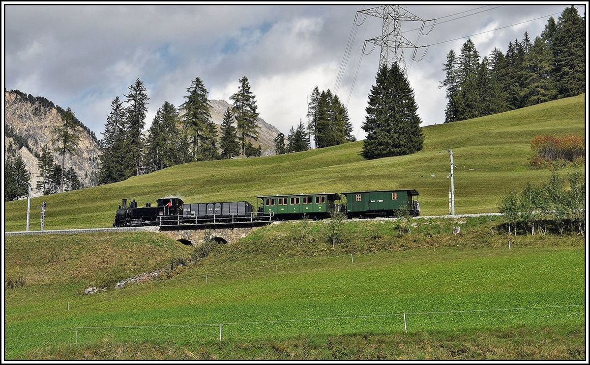 DZ9133 oberhalb Bergün mit Lok G3/4 11  Heidi  als Leerzug ins Depot Samedan. (30.09.2019)