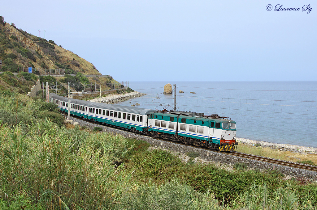 E.656 294 approaches Pollina whilst working IC730, 1007 Palermo Centrale-Messina Centrale, 9 Sept 2013.