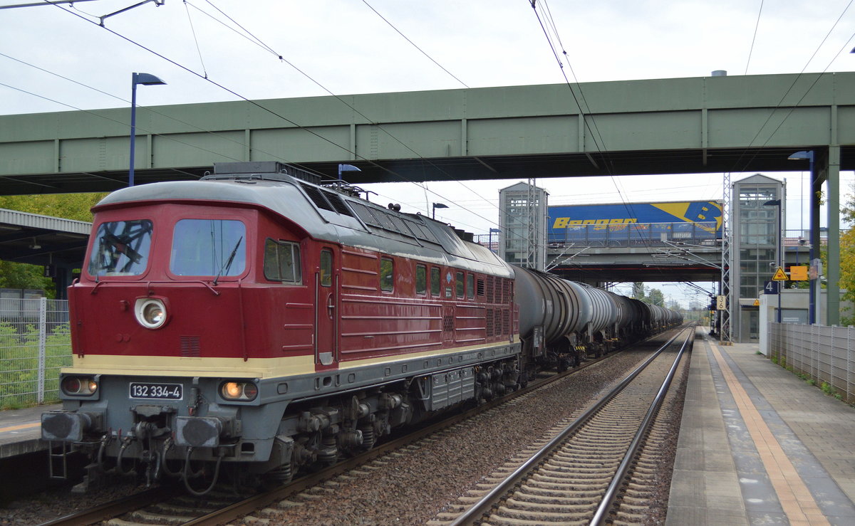 EBS 123 334-4 (92 80 1232 334-3 D-EBS) mit Kesselwagenzug (leer) Richtung Stendel am 14.09.18 Bf. Berlin-Hohenschönhausen.