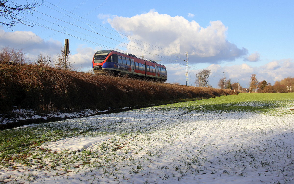 Ein Blick auf die Euregiobahn  RB20 in Richtung Kohlscheid,Herzogenrath.
Aufgenommen zwischen Aachen und Kohlscheid in Uersfeld,Richterich.
Bei Schnee und Sonnenschein am Kalten Nachmittag vom 3.2.2019.