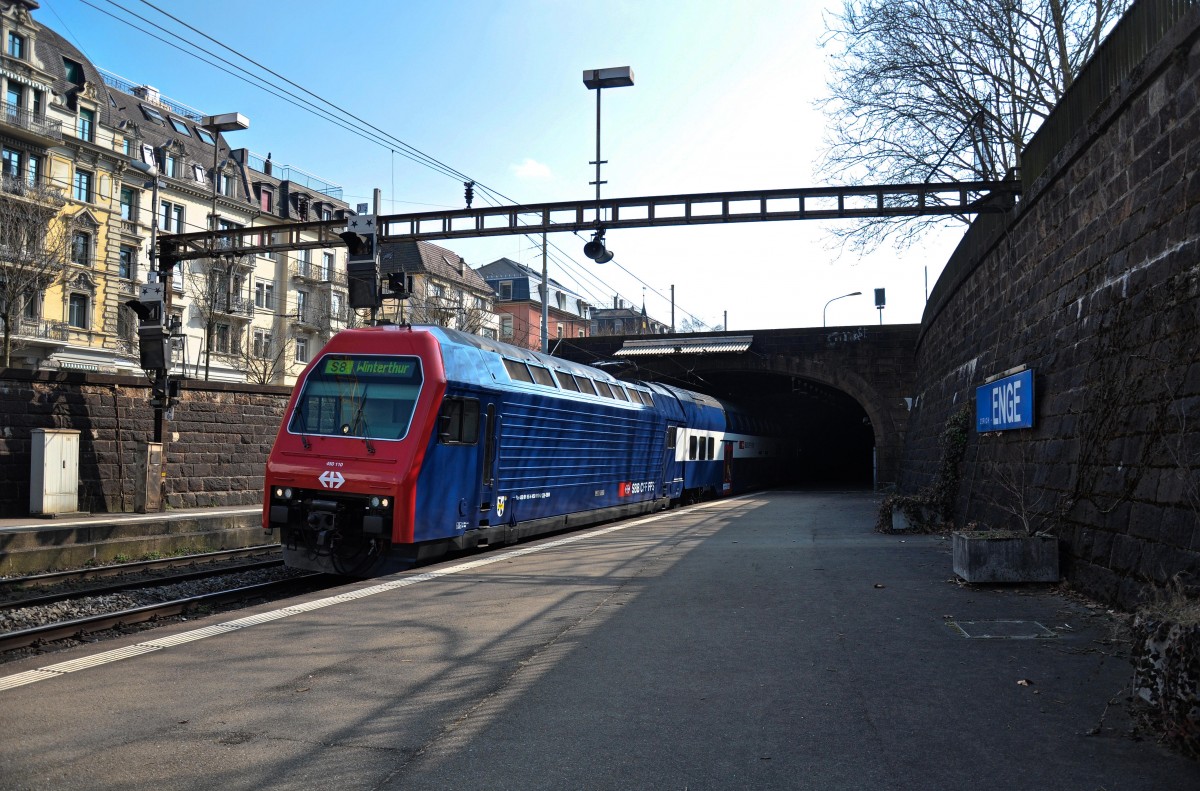 Ein DPZ+ (modernisierter DPZ) mit der Re 450 110-2  Hittnau  bei der Einfahrt in den Bahnhof Zürich Enge als S8 Richtung Winterthur. Aufgenommen am 19.03.2015