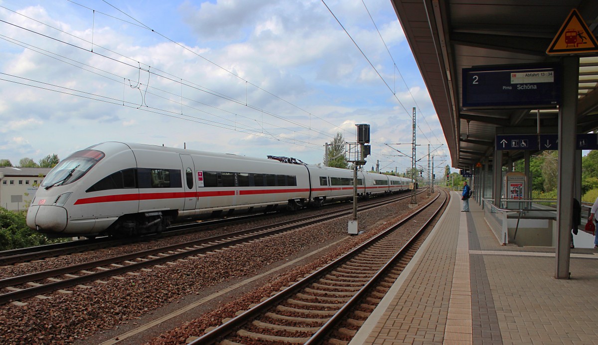 Ein ICE-T der BR 411 fährt am 30.08.2014 an der S-Bahn Station Dresden-Reick zur selbigen Abstellanlage vorbei.