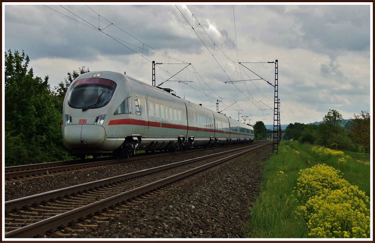 Ein ICE-T (BR 411) von Würzburg komment am 08.05.14 bei Thüngersheim.