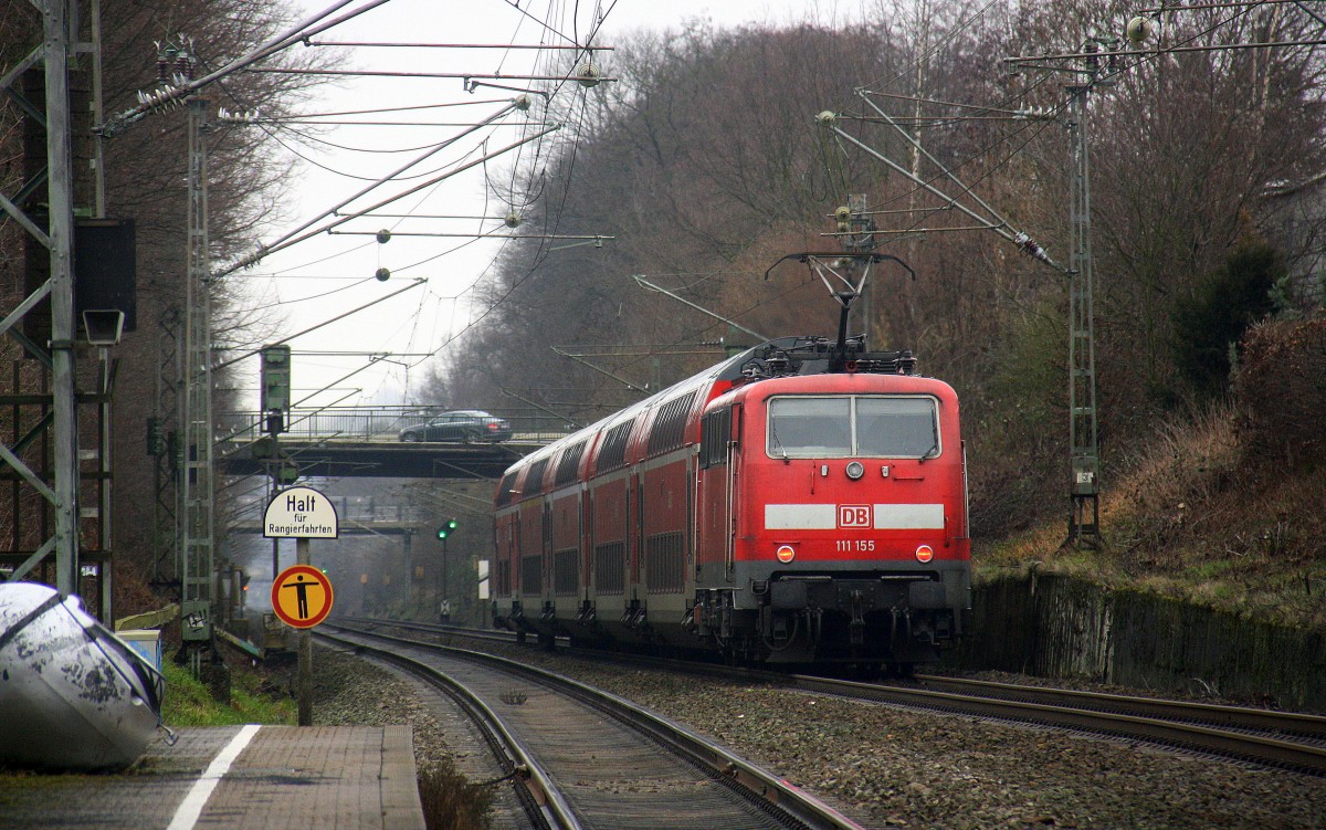Ein Nachschuss von der 111 155 DB schiebt den RE4  aus Aachen-Hbf nach Dortmund-Hbf kommt aus Richtung Aachen-West,Laurensberg,Richterich, und fährt durch Kohlscheid in Richtung Herzogenrath,Mönchengladbach,Neuss. 
Aufgenommen vom Bahnsteig 2 in Kohlscheid.
Bei Regenwolken am Mittag vom 5.2.2016.