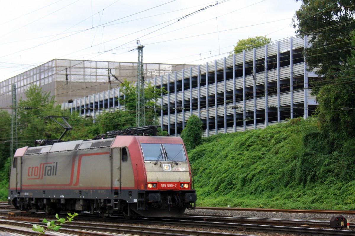 Ein Nachschuss von der 185 590-7 von Crossrail rangiert in Aachen-West bei Sommerregen am 18.8.2013. 