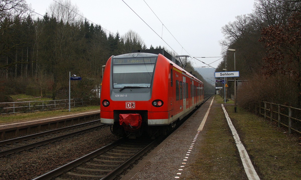 Ein Nachschuss von der 426 041-0 DB fährt als RB81 aus Trier-Hbf nach Koblenz-Hbf und hilt in Sehlem und fährt in Richtung Salmtal,Wittlich-Hbf,Koblenz. Bei Nebelwolken am Kalten Mittag vom 16.2.2015