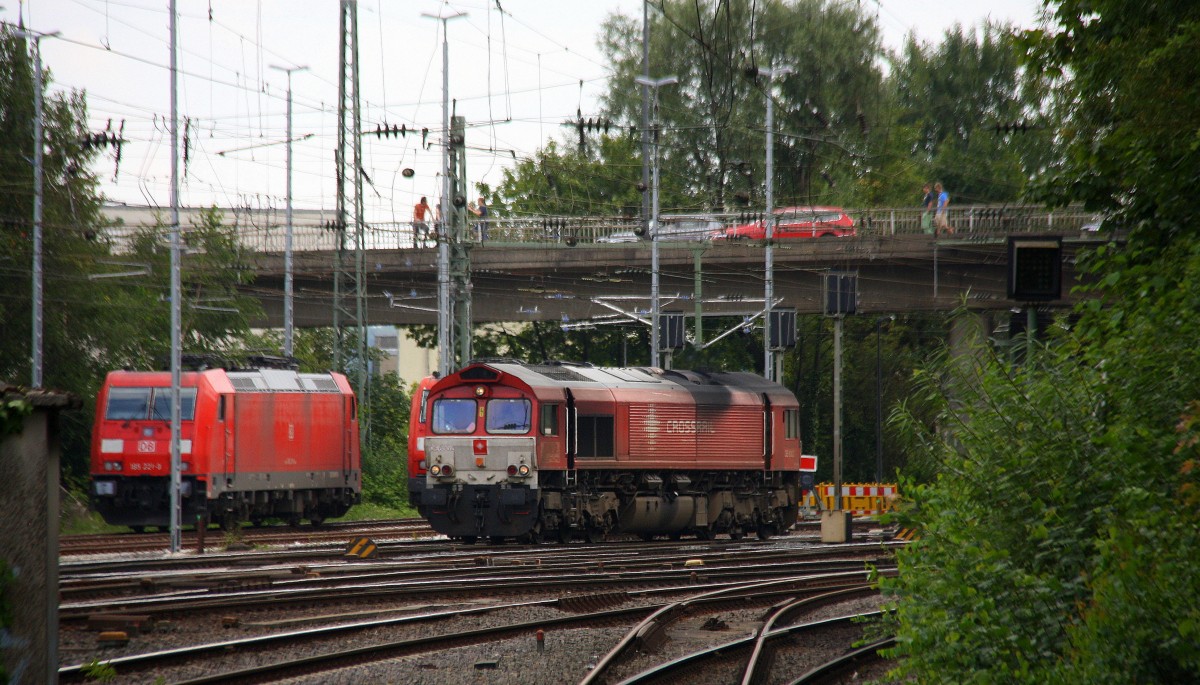 Ein Nachschuss von der  Class 66 DE6302  Federica  von Crossrail rangiert in Aachen-West.
Aufgenommen vom Bahnsteig in Aachen-West bei schönem Sonnenschien am Mittag vom 5.8.2014. 
 