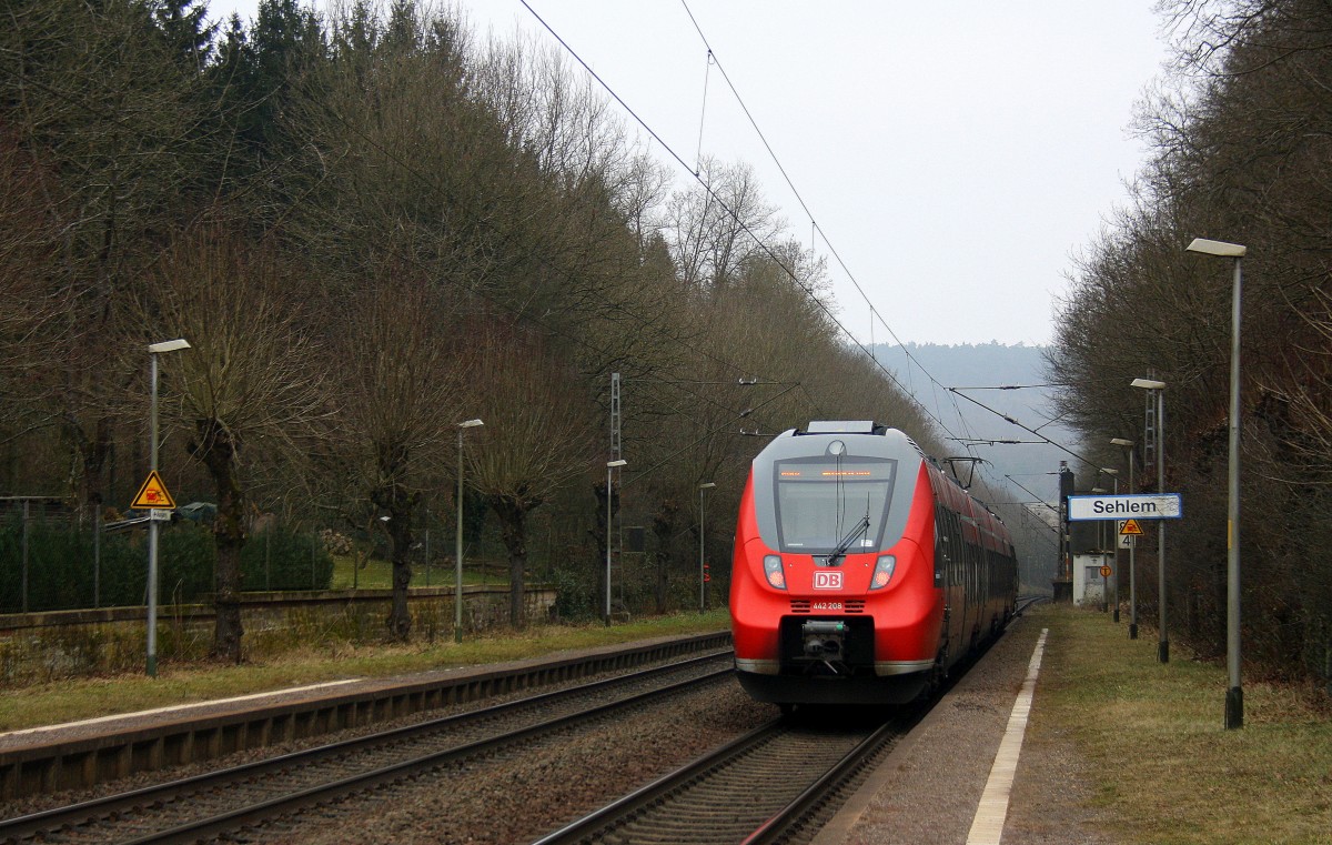 Ein Nachschuss von der Hamsterbacke 442 708 DB als RB82 aus Trier-Hbf nach Wittlich-Hbf  und hilt in Sehlem und fährt in Richtung Salmtal,Wittlich-Hbf in Richtung Salmtal,Wittlich-Hbf. 
Bei Nebelwolken am Kalten Mittag vom 16.2.2015.