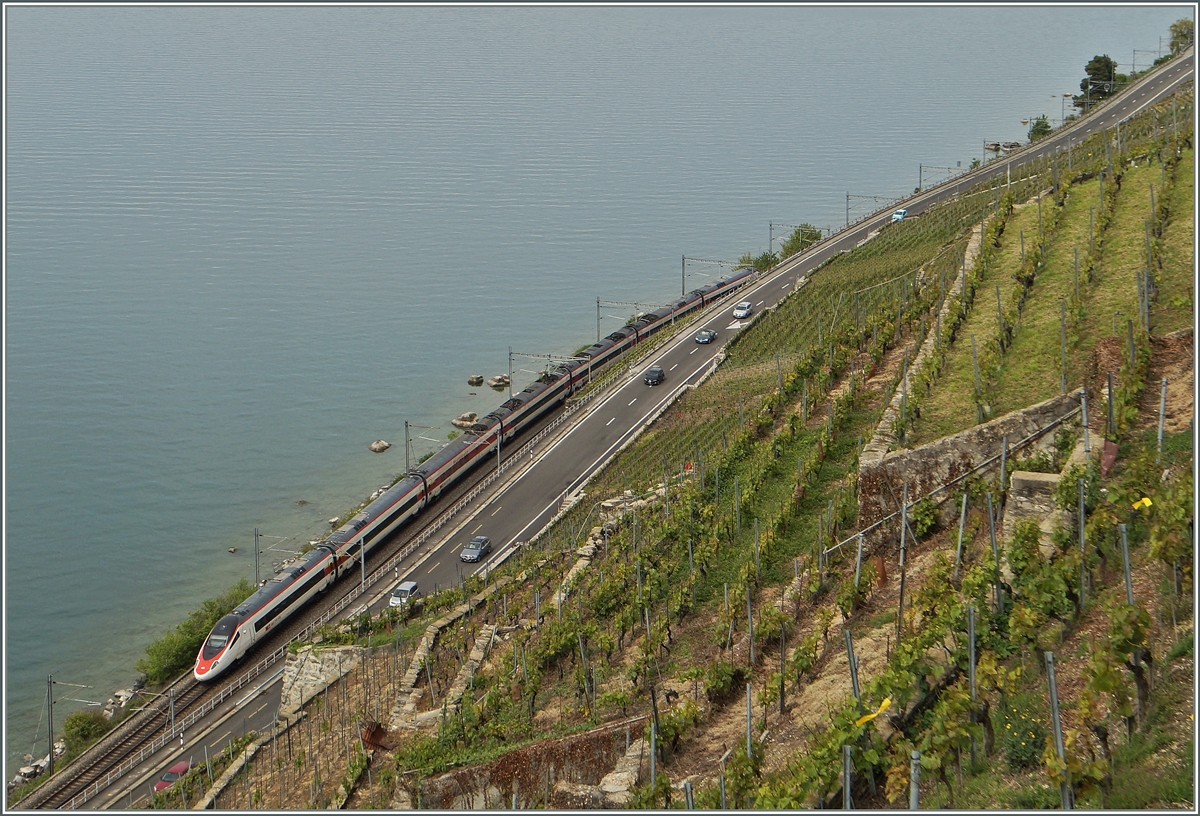 Ein SBB ETR 610 unterwegs als EC 32 von Milano nach Genève zwischen Rivaz und Epesses im Lavaux. 
8. Mai 2014