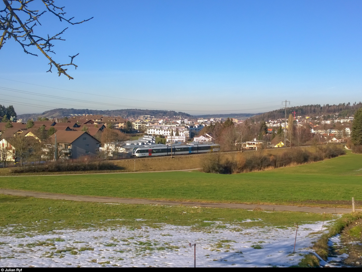 Ein THURBO-GTW verlässt am 26. Januar 2016 als S26 die Stadt Winterthur in Richtung Rüti ZH.
