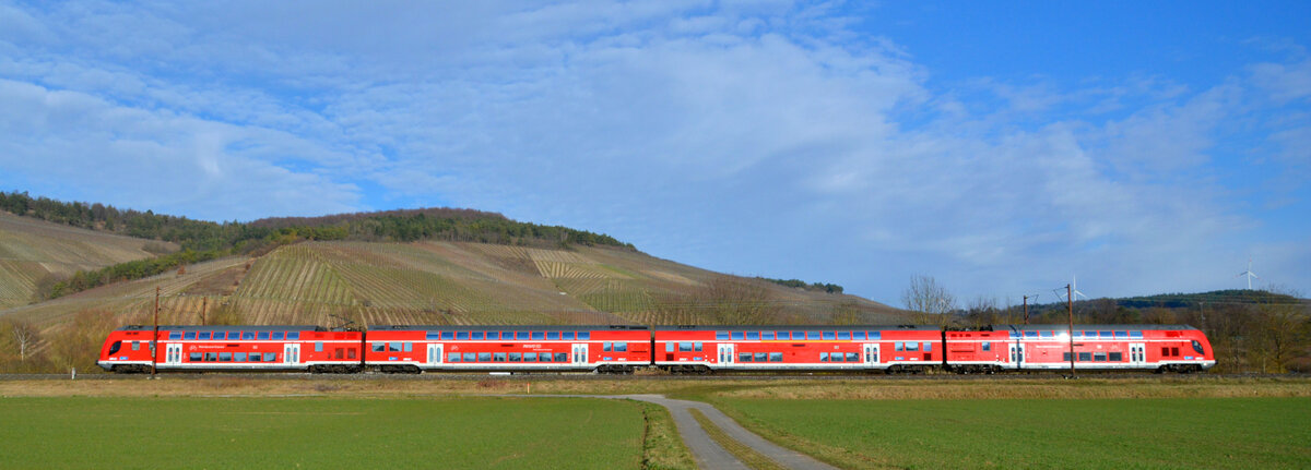 Ein unerkannt gebliebener Twindexx 445 als DB Regio  Main-Spessart-Express  am Kilometer 14,0 bei Thüngersheim. 02.03.2022