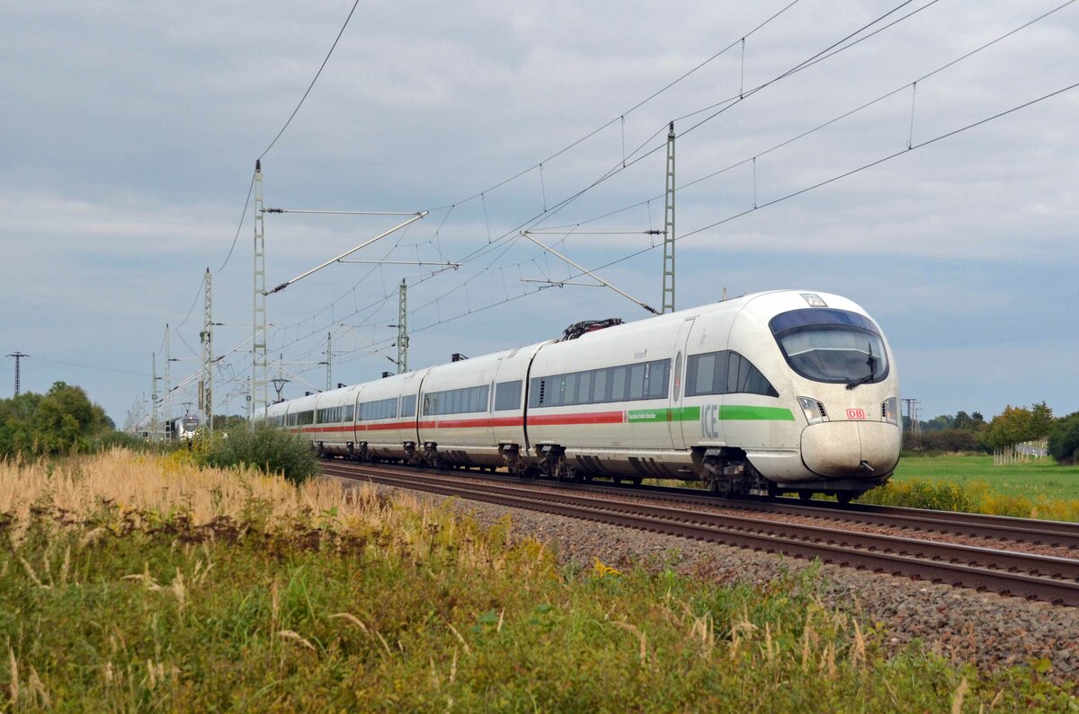 Ein verspäteter ICE der Reihe 411 überholte am 19.09.21 in Gräfenhainichen die S-Bahn von Wittenberg nach Leipzig. 