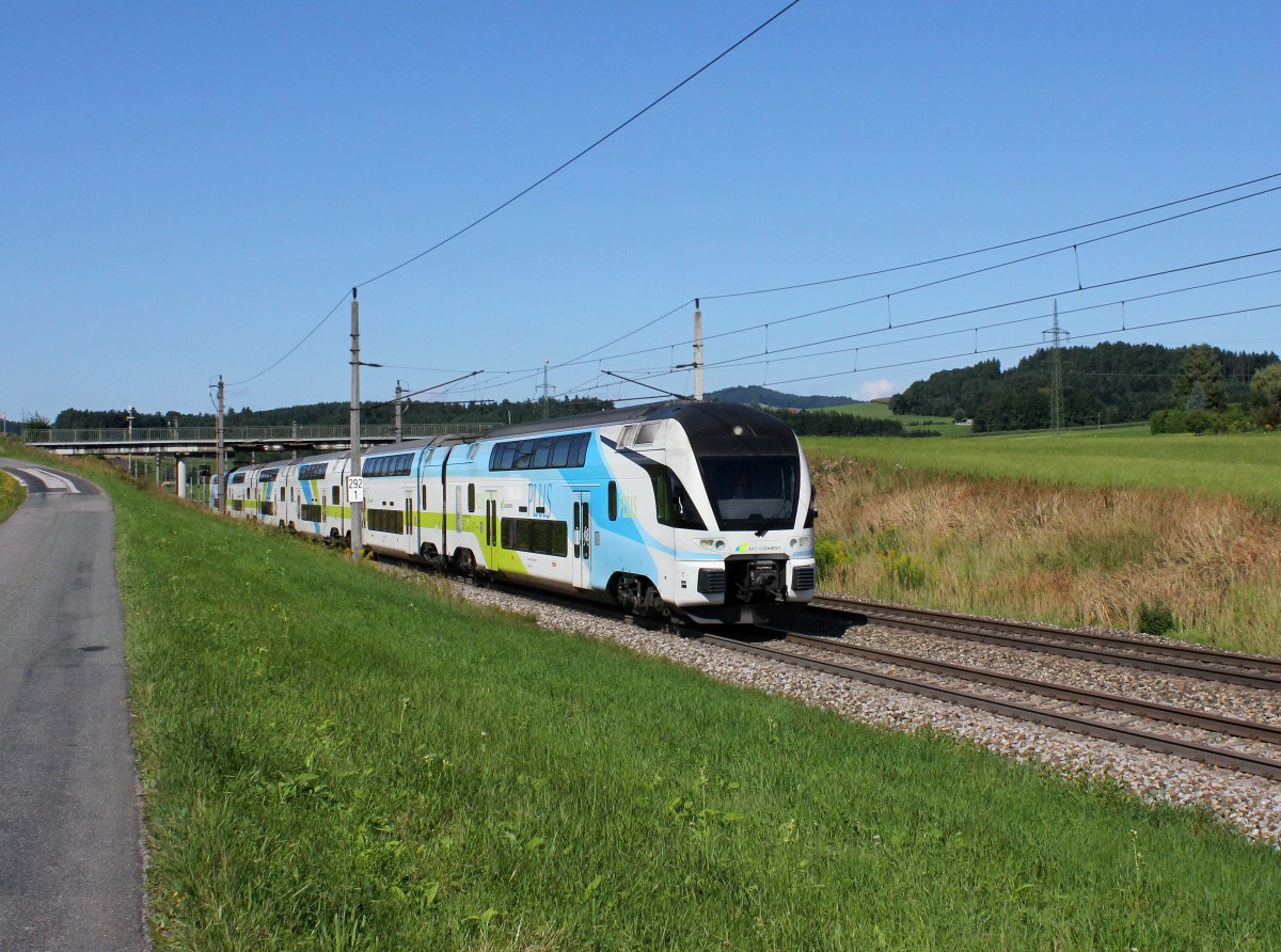 Ein Westbahn KISS nach Wien am 17.08.2014 unterwegs bei Köstendorf.