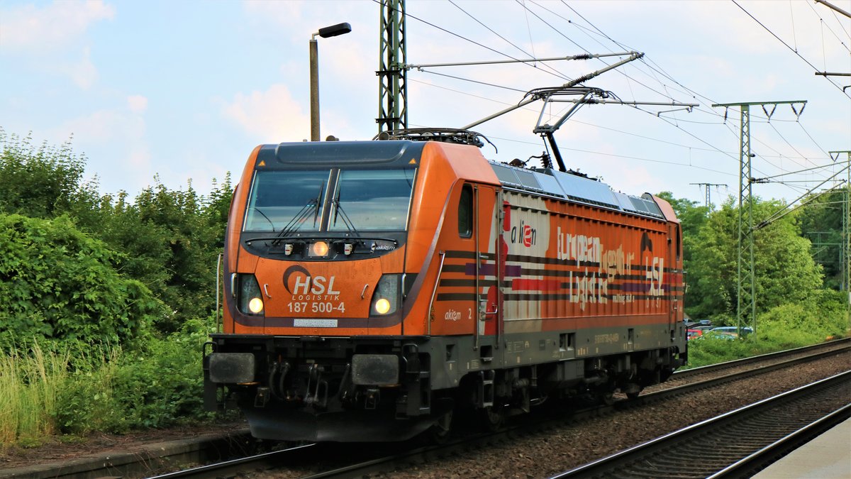 Eine orangene 187 500-4 der Firma HSL als Leerzug Richtung Coswig unterwegs (04.06.2018, Hp Cotta)