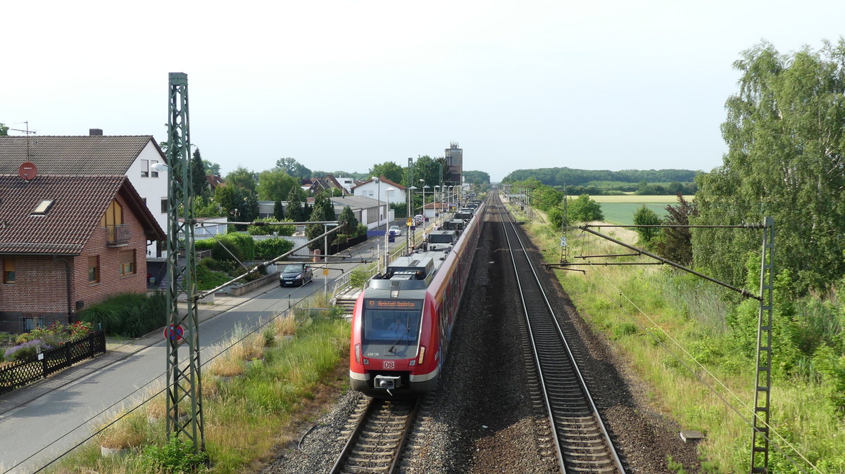 Eine S7 nach Riedstadt-Goddelau verlässt den Haltpunkt Groß-Gerau Dornheim. Aufgenommen am 7.6.2018 18:03