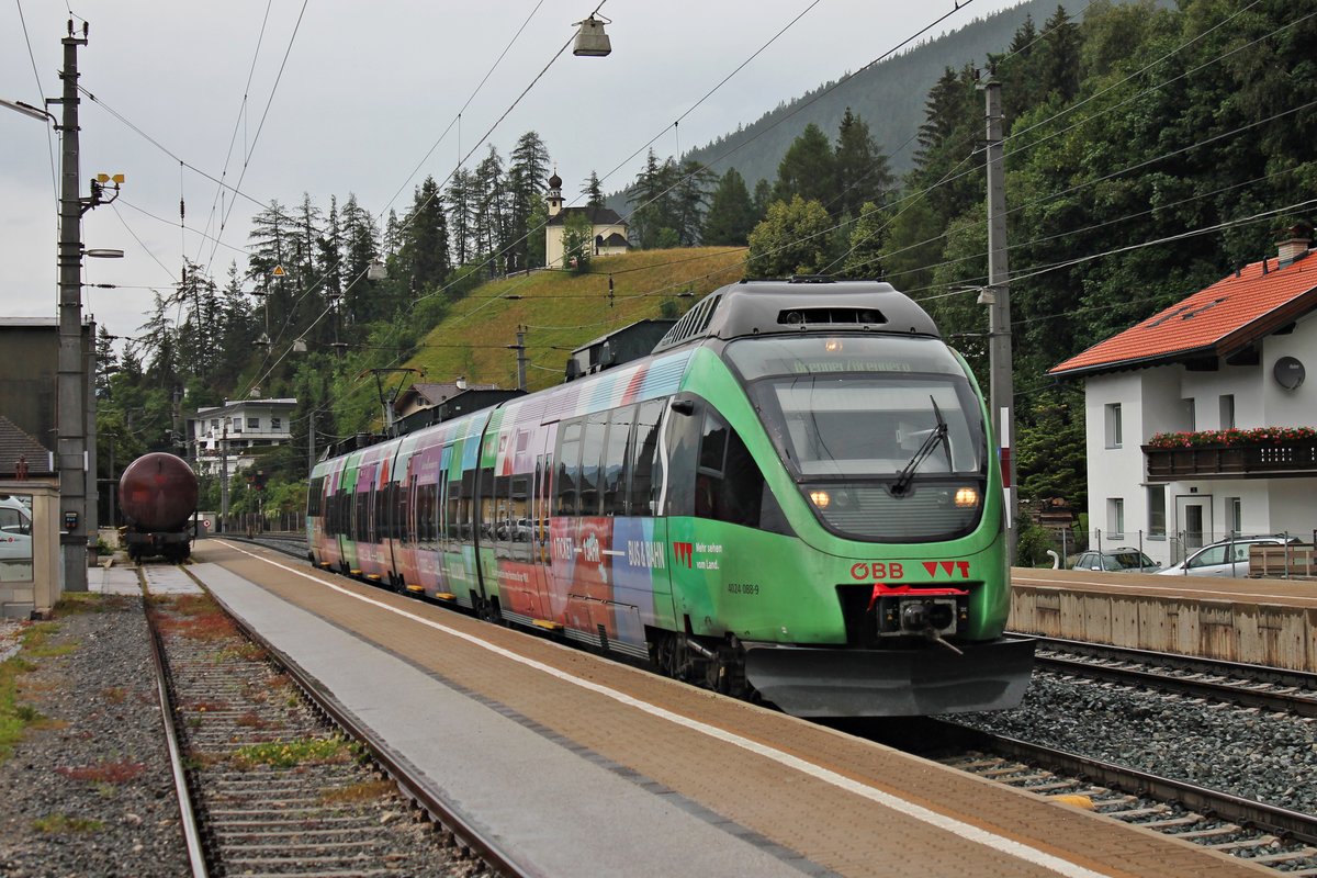 Einfahrt am 04.07.2018 von ÖBB 4024 088-9  VVT - Verkehrsverbund Tirol  als REX (Kuftsein - Brenner/Brennero) in den Bahnhof von Steinach in Tirol.